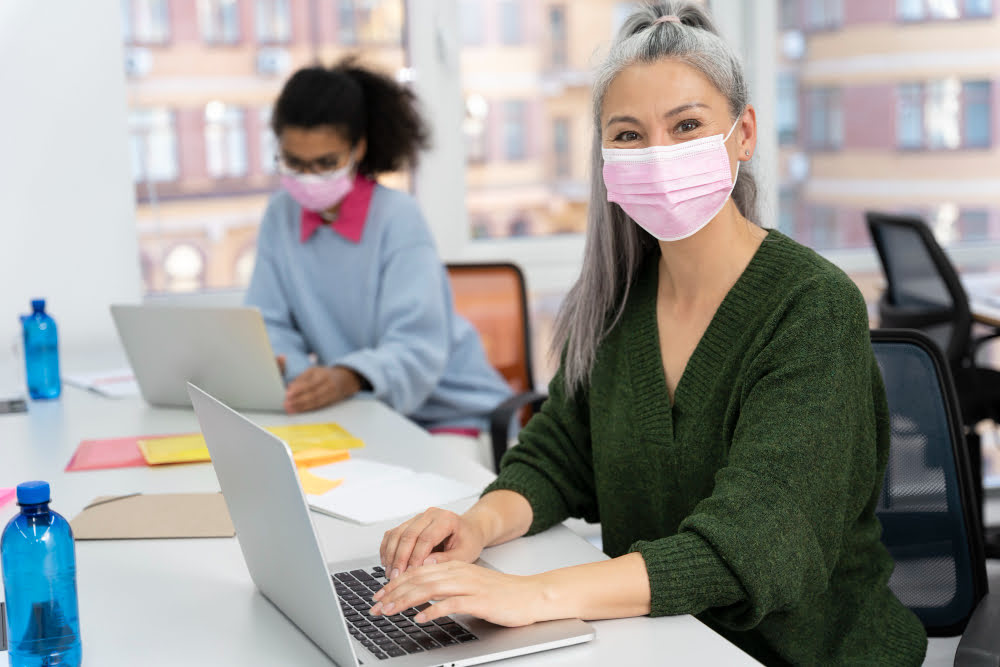 Online PhD in Public Health student with Mask